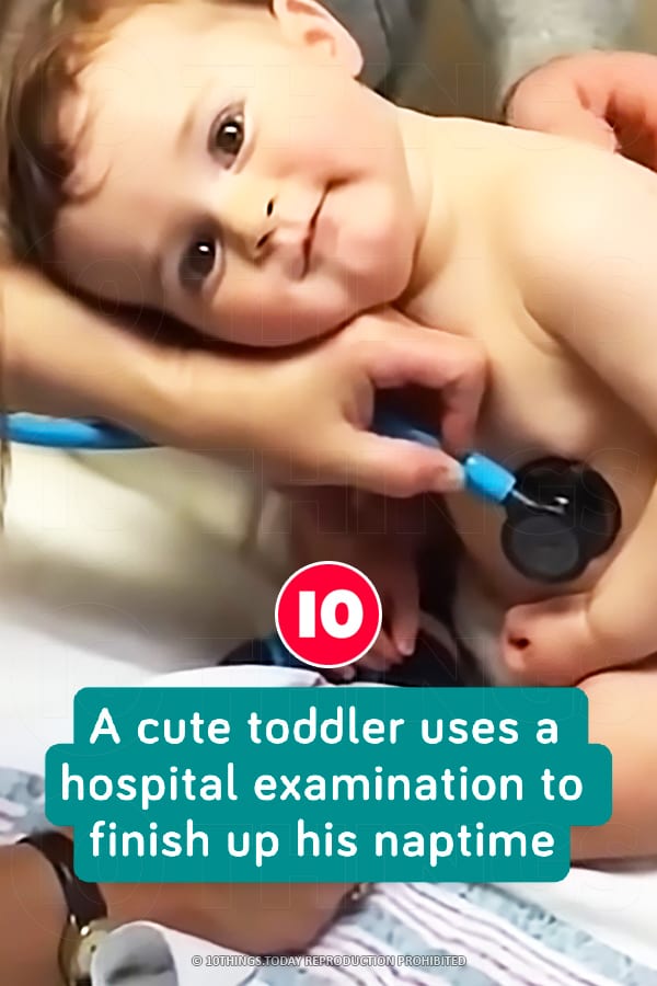 A cute toddler uses a hospital examination to finish up his naptime
