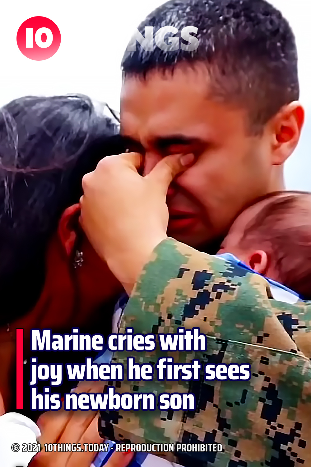 Marine cries with joy when he first sees his newborn son